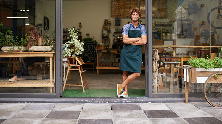 Business owner outside his new shop